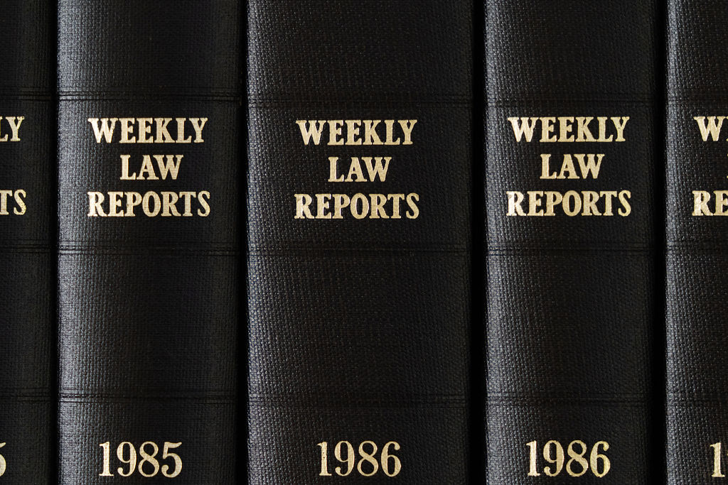 Law reports lined up on a shelf at Svenson Barristers